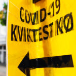 Covid -19 Kviktest kø skilte