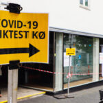 Covid -19 Kviktest kø skilte